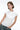 semi sheer, cap-sleeve button-up collared top featuring an external bra detail layered over