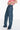 dark wash jean with stud details at hip and midcalf
