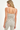 nude tank top and capri pants with black polka dot pattern on a white background