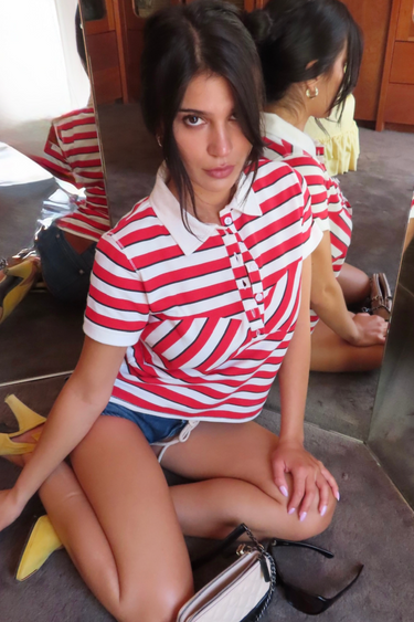 short sleeve polo button-up shirt with white collar and red, white, and black stripes