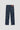 Blue jeans with starshaped studs on a light gray background