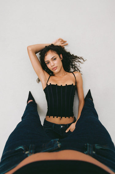 spaghetti strap corset with sheer mesh boned paneling and demi cups 